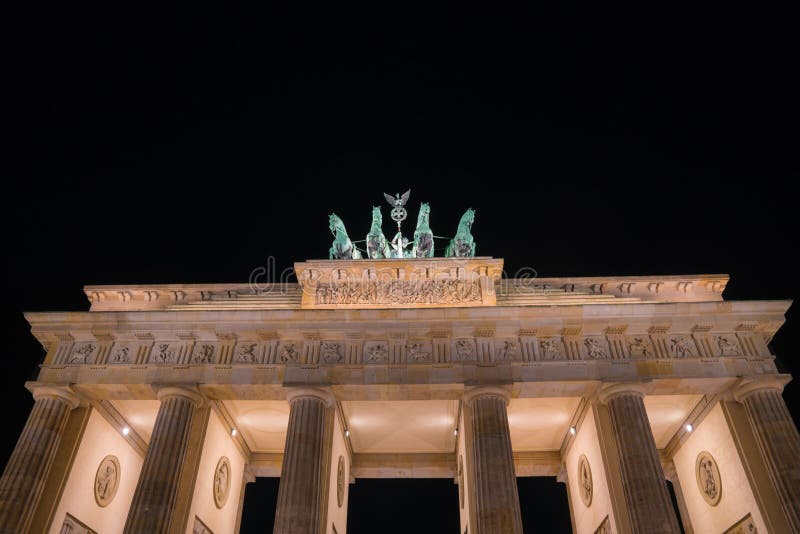Historic Brandenburg Gate illuminated at night stock image Historic Brandenburg Gate illuminated at night stock image