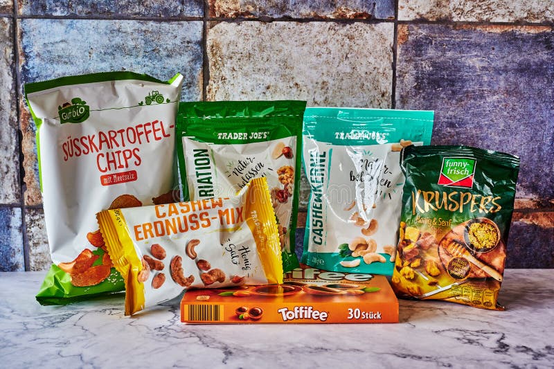 Several Packs of Snacks from Different Companies Editorial Photography