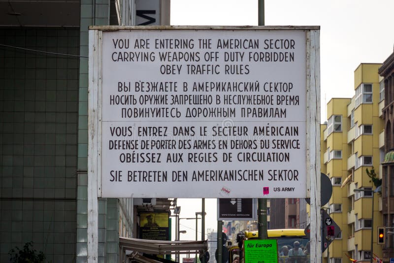 berlin-may-historical-sign-warning-eastern-entering-american-sector-former-checkpoint-charlie-border-crossing-132267461.jpg