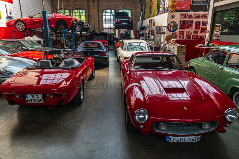 32th Berlin-Brandenburg Oldtimer Day. BERLIN - MAY 11, 2019: Workshop on repair and maintenance of Italian classic and sports cars. 32th Berlin-Brandenburg royalty free stock images 32th Berlin-Brandenburg Oldtimer Day. BERLIN - MAY 11, 2019: Workshop on repair and maintenance of Italian classic and sports cars. 32th Berlin-Brandenburg royalty free stock images