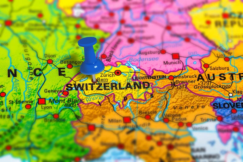 Bern in Switzerland pinned on colorful political map of Europe. Geopolitical school atlas. Tilt shift effect. Bern in Switzerland pinned on colorful political map of Europe. Geopolitical school atlas. Tilt shift effect.