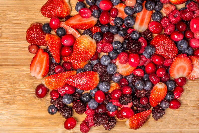 Berries on Cutting Board stock image. Image of smoothies 48333833
