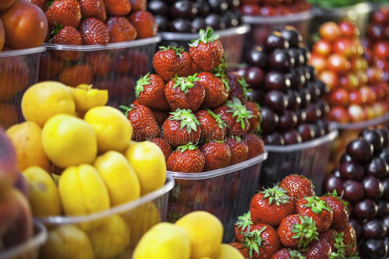 Berries in a market stock image. Image of berries, group 73148651