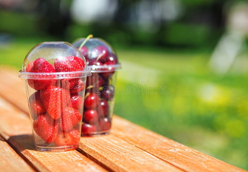Berries in plastic cup stock image. Image of away, berry 77090503