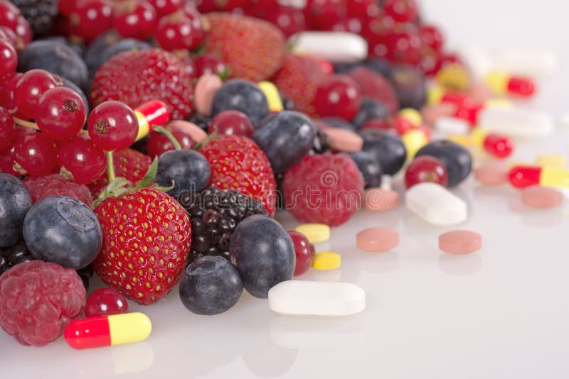 Berries, Vitamins and Nutritional Supplements Stock Image Image of