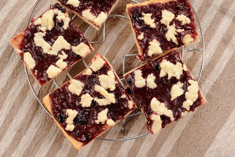 Berry Jam Cookies on Stripped Napkin Background Topview Stock Photo