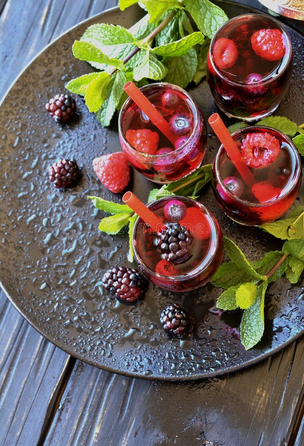 Berry Juice In A Glass With Berries, Selective Focus Stock Photo