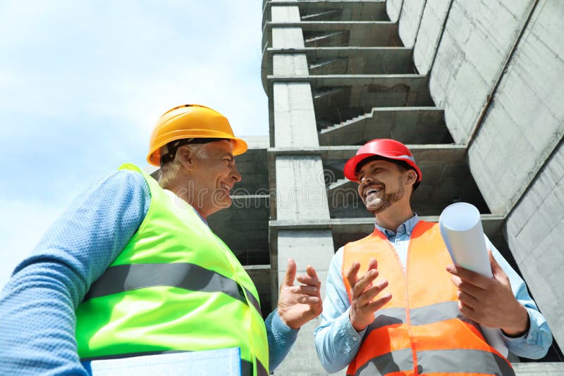 Berufsingenieure in der Schutzausrüstung stockfoto Berufsingenieure in der Schutzausrüstung stockfoto