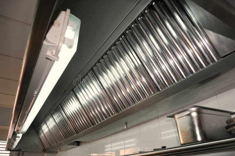 Exhaust systems, hood filters detail in a professional kitchen. Exhaust systems, hood filters detail in a professional kitchen