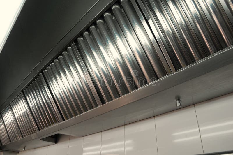 Exhaust systems, hood filters detail in a professional kitchen. Exhaust systems, hood filters detail in a professional kitchen