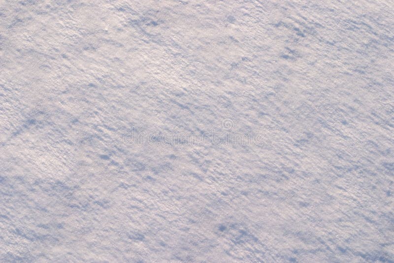 Texture of the snow. Thin snow crust on the surface of the frozen lake. Natural sunlight emphasizes texture. Pattern # 1. Texture of the snow. Thin snow crust on the surface of the frozen lake. Natural sunlight emphasizes texture. Pattern # 1