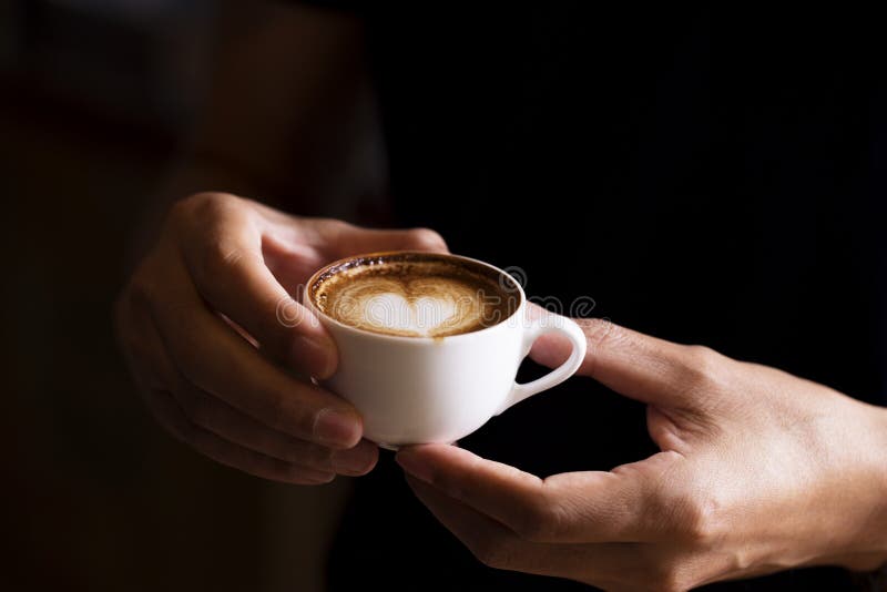 Best coffee in hand stock photo. Image of working, cappuccino 125931726