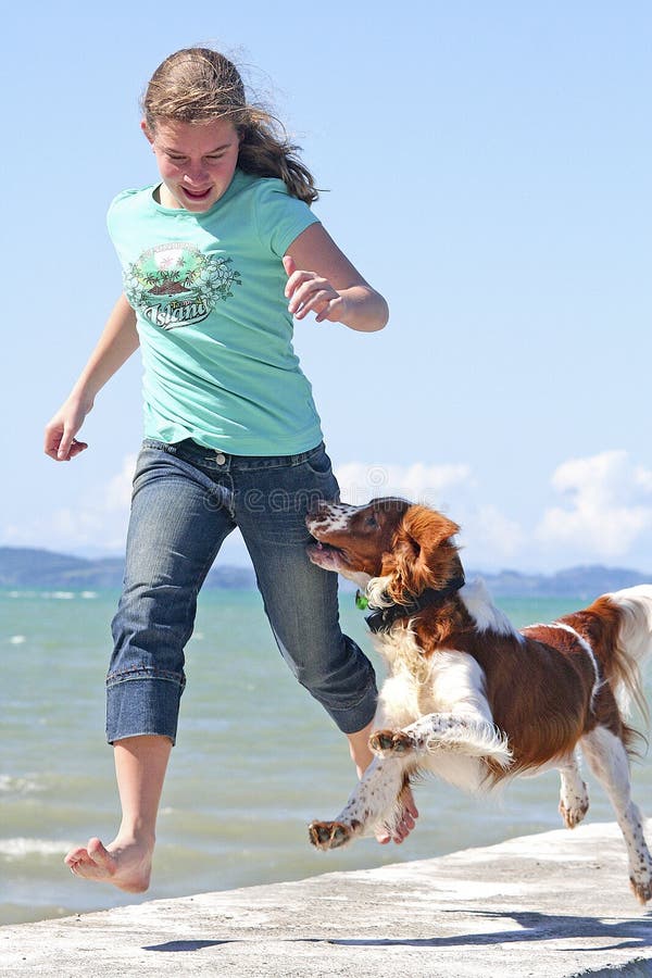 Teen girl with cute dogs stock photo. Image of portrait - 33251354