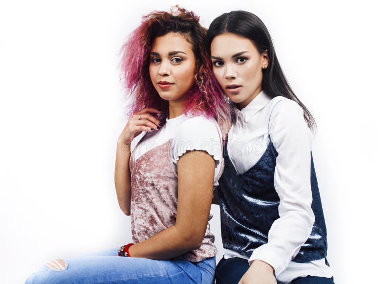 Best friends teenage girls together having fun, posing emotional, two diverse nations students: african american and stock photo Best friends teenage girls together having fun, posing emotional, two diverse nations students: african american and stock photo