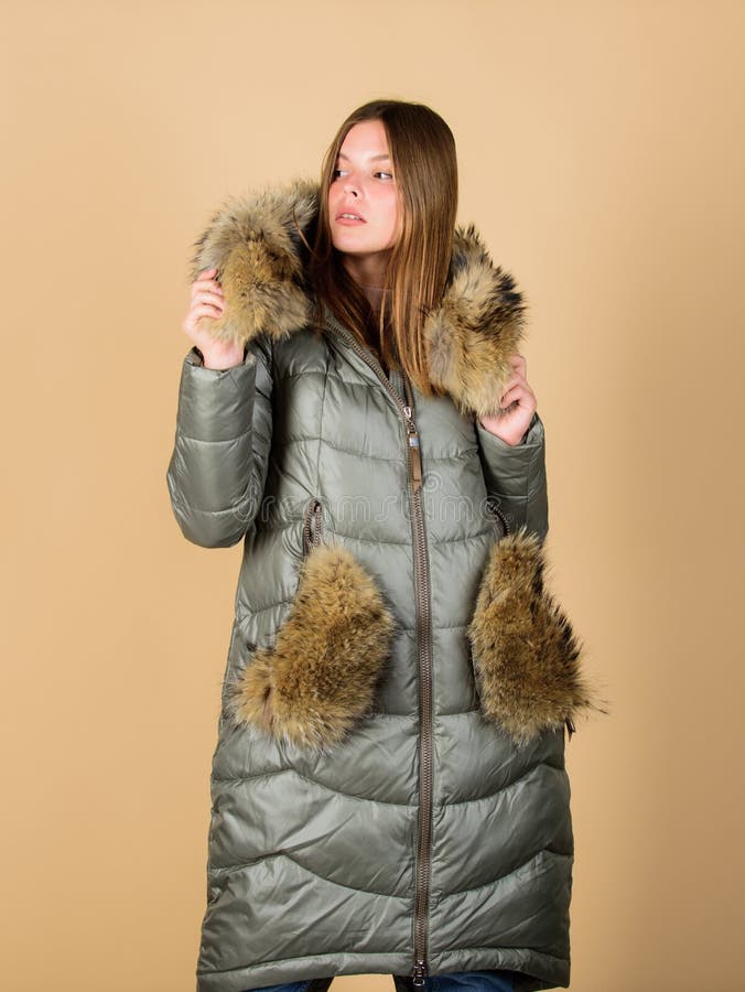 Best holiday. girl in puffed coat. faux fur fashion. beauty in winter clothing. cold season shopping. woman in padded.