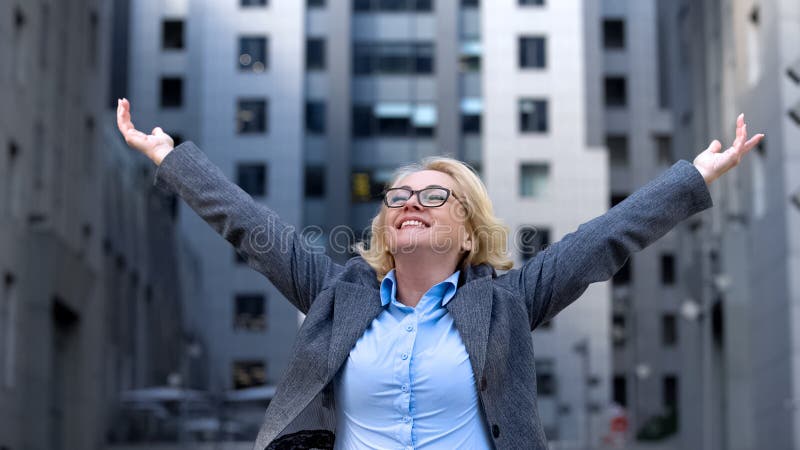 Cheerful company director raised hands up, life work satisfaction, free breath, stock photo. Cheerful company director raised hands up, life work satisfaction, free breath, stock photo