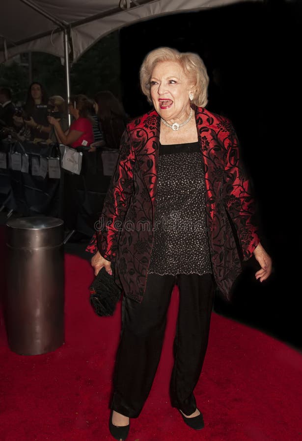 TV personality and comedic actress Betty White, who at nearly 90, was riding the crest of a late-life wave of popularity and adulation. She arrived on the red carpet for Time Magazine`s 100 Most Influential People gala in New York City on May 4, 2010.  White&#x27;s television career spanned 8 decades.  She participated in exprimental tv in Los Angeles in 1939 and was a regular co-host on morning and daytime L.A. tv by 1949. White died at her home in Los Angeles on December 31, 2021, less than 3 weeks before she would have turned 100 years of age. TV personality and comedic actress Betty White, who at nearly 90, was riding the crest of a late-life wave of popularity and adulation. She arrived on the red carpet for Time Magazine`s 100 Most Influential People gala in New York City on May 4, 2010.  White&#x27;s television career spanned 8 decades.  She participated in exprimental tv in Los Angeles in 1939 and was a regular co-host on morning and daytime L.A. tv by 1949. White died at her home in Los Angeles on December 31, 2021, less than 3 weeks before she would have turned 100 years of age.