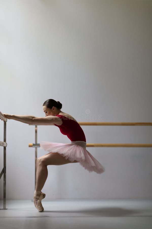 Beuatiful ballerina training in the class stock images