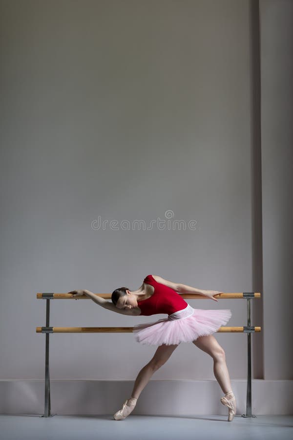 Beuatiful ballerina training in the class royalty free stock images