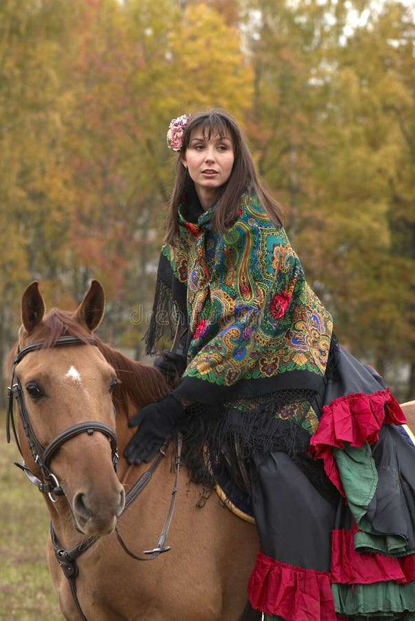 Beuatiful young girl on horseback