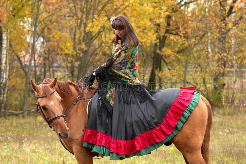 Beuatiful young girl on horseback