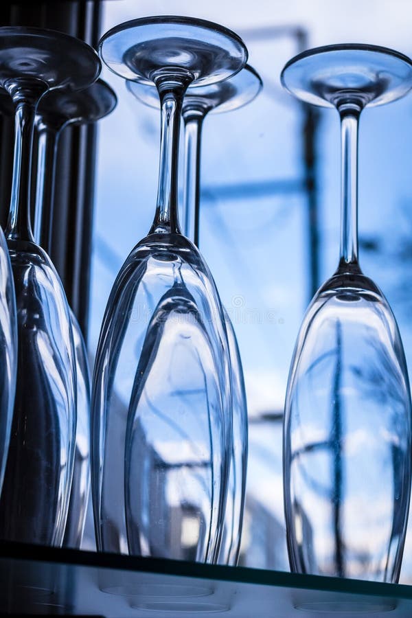 Display of champagne flutes sitting on shelf in window of bar. Display of champagne flutes sitting on shelf in window of bar