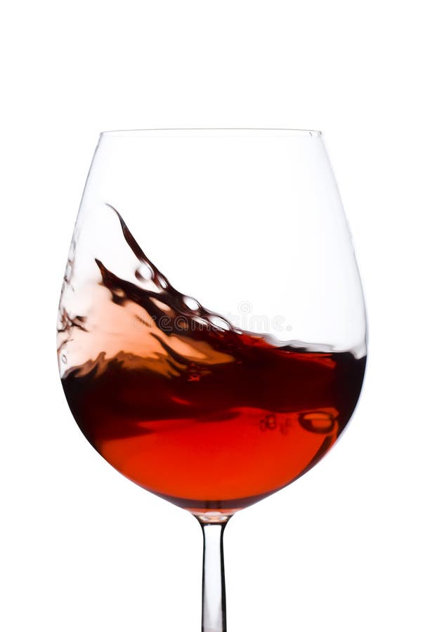 Isolated and moving red wine glass over a white background. Isolated and moving red wine glass over a white background