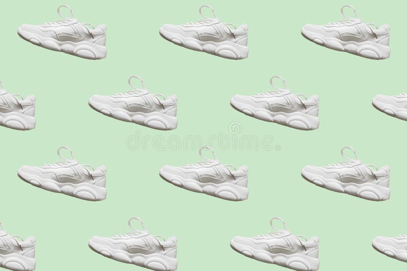 Seamless regular pattern of light colored casual sneakers on a mint background. Photo collage. Fashion blog, sport lifestyle. Printing on fabric, wrapping paper. Seamless regular pattern of light colored casual sneakers on a mint background. Photo collage. Fashion blog, sport lifestyle. Printing on fabric, wrapping paper