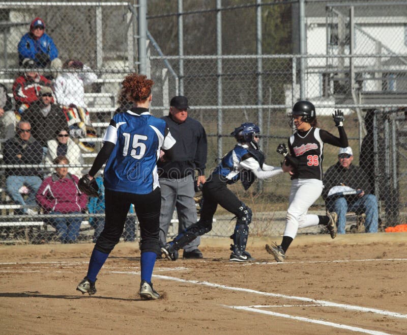 Action at Waukesha West High School. The Varsity Girls Wolverines fast pitch softball team played against Waukesha South High School Varsity Girls . This was the first season home game for Waukesha West. Waukesha West won 4-2. Catcher tagging out the runner. Action at Waukesha West High School. The Varsity Girls Wolverines fast pitch softball team played against Waukesha South High School Varsity Girls . This was the first season home game for Waukesha West. Waukesha West won 4-2. Catcher tagging out the runner.