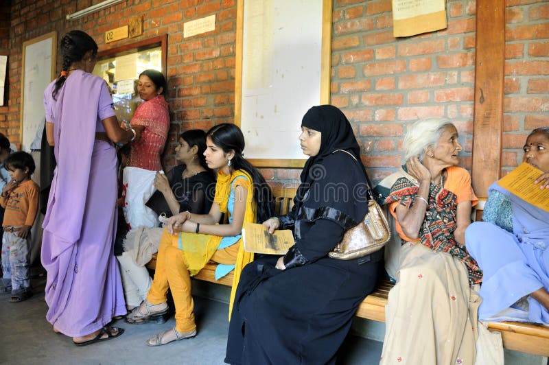 BHOPAL- DECEMBER 6: in Bhopal -Three generation of the Bhopal gas disaster survivors waiting in a corridor of a free clinic in India on December 6, 2010. BHOPAL- DECEMBER 6: in Bhopal -Three generation of the Bhopal gas disaster survivors waiting in a corridor of a free clinic in India on December 6, 2010.