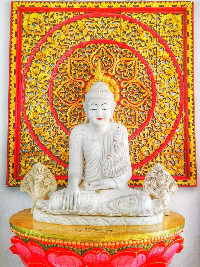 Bhudda sitting on the red lotus royalty free stock photo Bhudda sitting on the red lotus royalty free stock photo