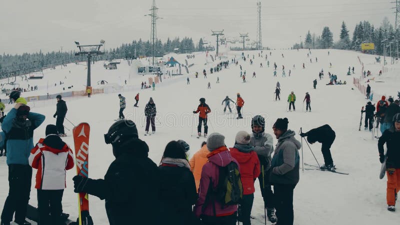 BIALKA TATRZANSKA, POLAND - FEBRUARY 4, 2018. Crowded alpine ski slope, the Tatra mountains