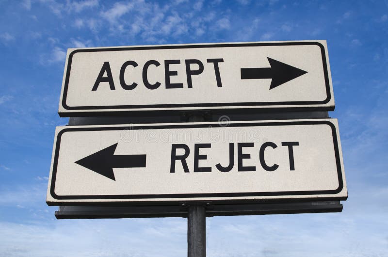 Accept vs reject. White two street signs with arrow on metal pole with word. Directional road. Crossroads Road Sign, Two Arrow. Blue sky background. Two way road sign with text. Two arrows on a pole pointing in different directions. Accept vs reject. White two street signs with arrow on metal pole with word. Directional road. Crossroads Road Sign, Two Arrow. Blue sky background. Two way road sign with text. Two arrows on a pole pointing in different directions