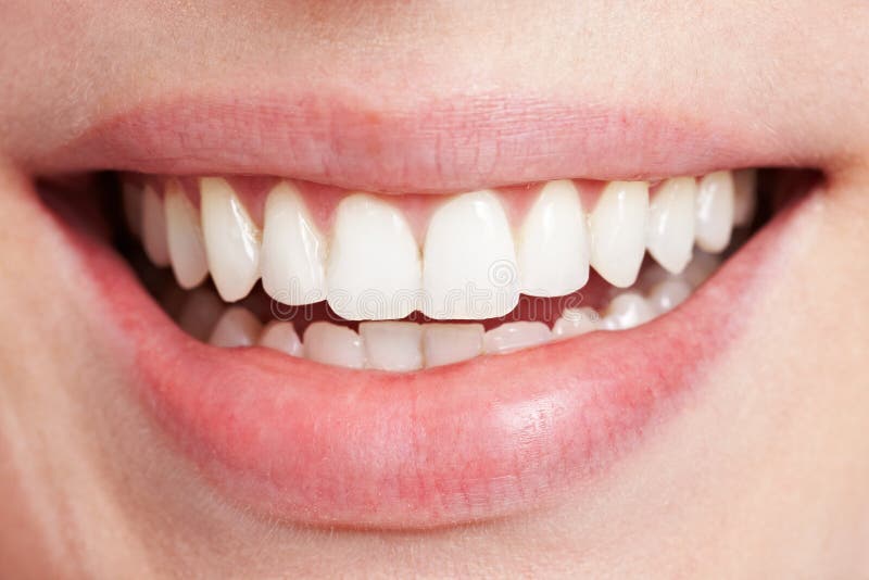 Happy smiling female mouth with white teeth. Happy smiling female mouth with white teeth