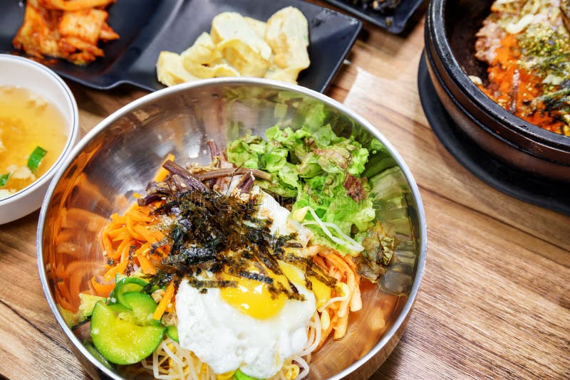Bibimbap is a popular Korean dish. Mixed rice with meat royalty free stock image Bibimbap is a popular Korean dish. Mixed rice with meat royalty free stock image