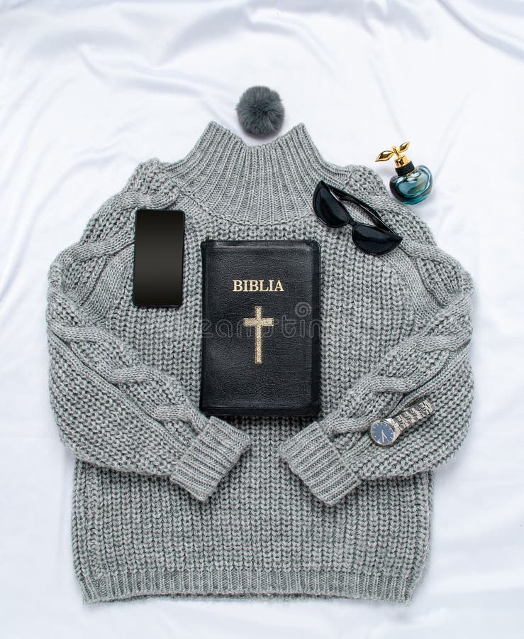 Bible Black and the Watch is Shot on a Sweater Stock Image - Image of