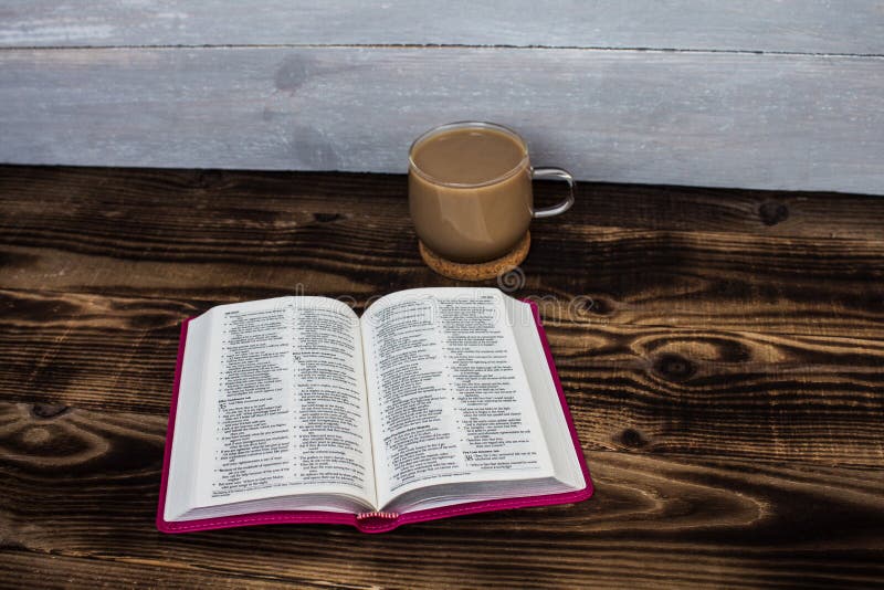A Cup Of Coffee And Bible On Wooden Background Stock Photo - Image of