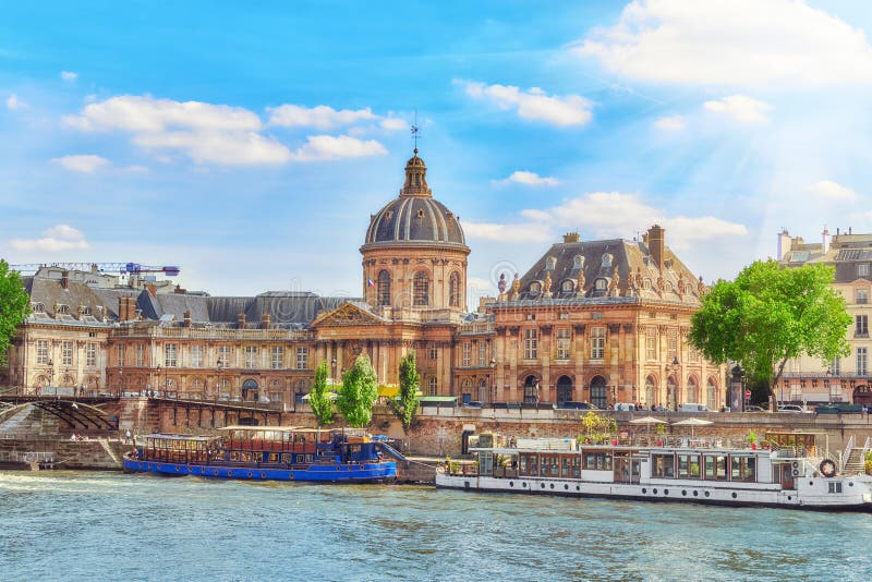 Mazarin Library Bibliotheque Mazarine and Bridge of the Arts Pont des Arts in Paris. France. Mazarin Library Bibliotheque Mazarine and Bridge of the Arts Pont des Arts in Paris. France.