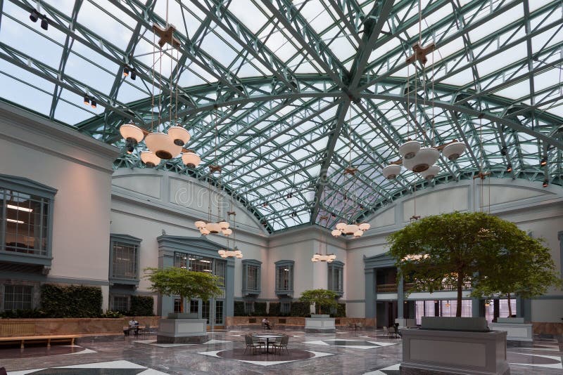 The main hall at the top of the building, flooded with light from a glass ceiling. Harold Washington Library in downtown Chicago, Illinois, United States. The main hall at the top of the building, flooded with light from a glass ceiling. Harold Washington Library in downtown Chicago, Illinois, United States.