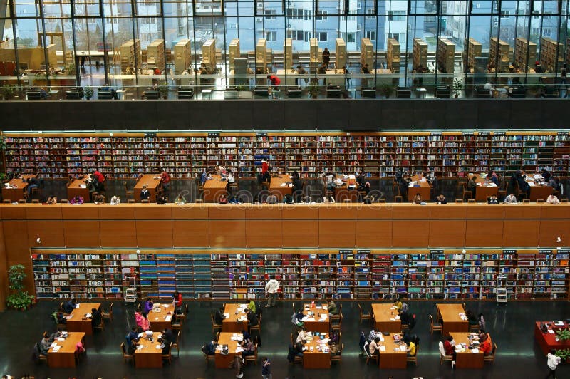 Beijing, China. National library there are many people learning, reading a book. It has a lot of books, near the college students to learn, with tsinghua university, Peking University. The largest library in the country. Beijing, China. National library there are many people learning, reading a book. It has a lot of books, near the college students to learn, with tsinghua university, Peking University. The largest library in the country.