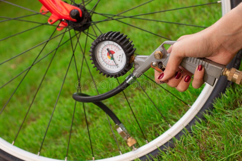 Bicycle and air compressor stock image. Image of modern 26556391