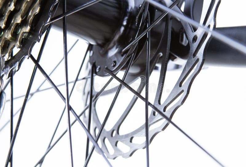Bicycle Disc Brakes Closeup, Spokes. Light Background Transmission