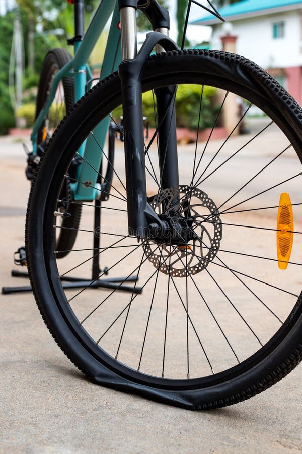 Flat bicycle tire stock photo. Image of deflated, tire 25210250