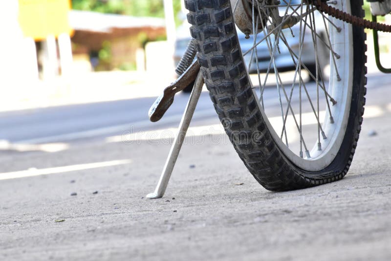 Bicycle flat tires stock photo. Image of accident, bike 187779362