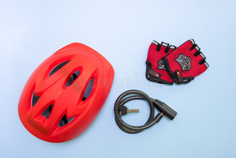 Bicycle Helmet, Lock with Keys and Gloves on a Blue Background Stock Photo Image of bike