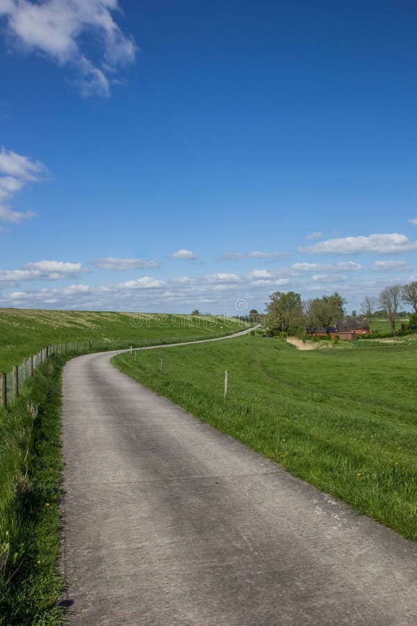 Bicycle path along the dollard route in Ostfriesland, Germany