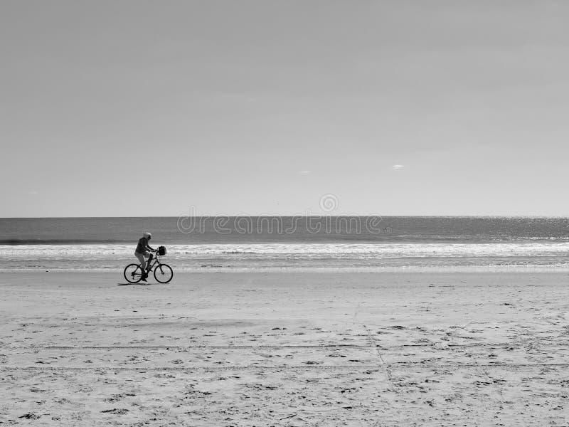 Bicycle Ride on Deserted Beach stock photos Bicycle Ride on Deserted Beach stock photos