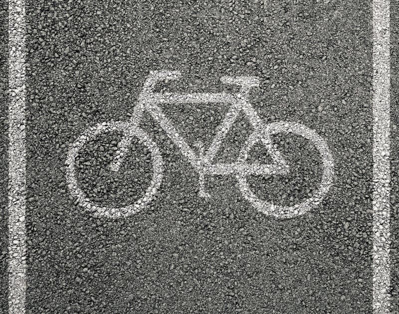 Bicycle sign on asphalt