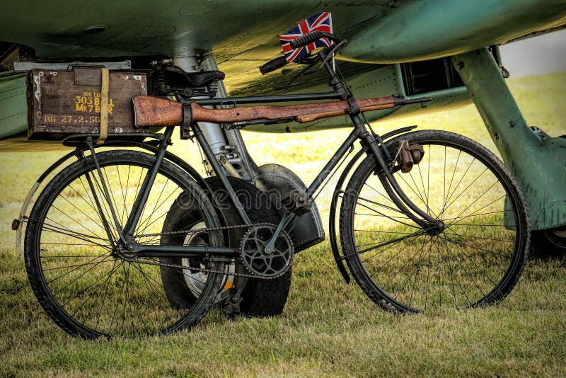 Bicycle under a Hurricane aircraft at Biggin Hill London. A Bicycle under a Hurricane aircraft at Biggin Hill London