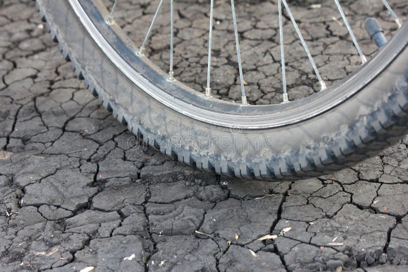 Bicycle Wheel on Cracked Earth Stock Photo Image of spoke, equipment